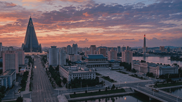 Sunset view of North Korean city with high-rise buildings
