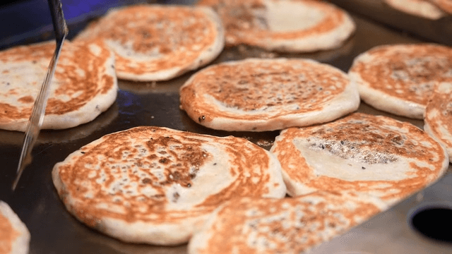 Traditional hotteok cooked on iron plate