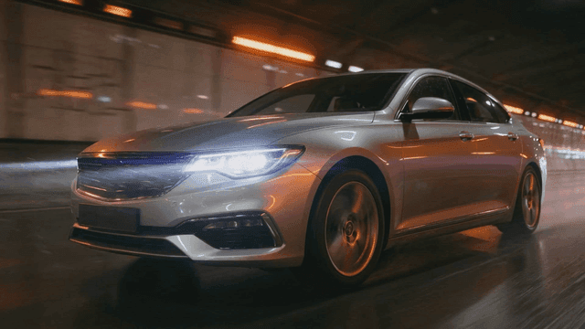 Cars speeding through tunnel