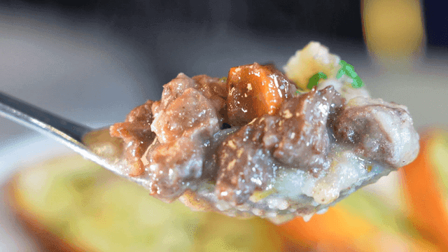 Spoonful of hearty beef stew