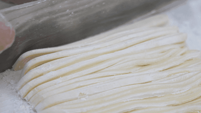 Handmade noodles made by slicing dough thinly