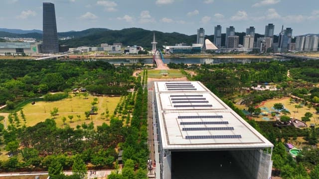 Green park with cityscape background