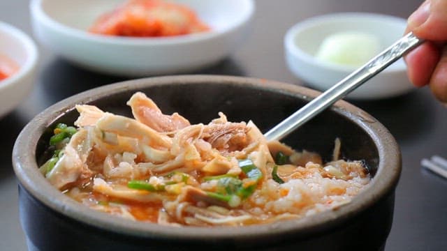 Chicken soup with rice in a bowl