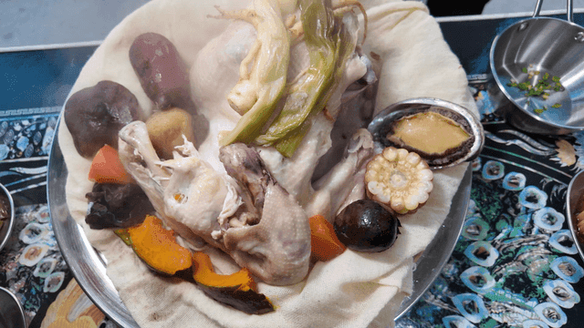 Steamed native chicken with abalone and vegetables