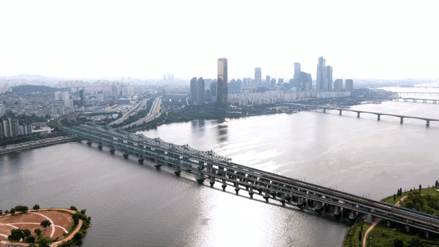City skyline and bridges over river