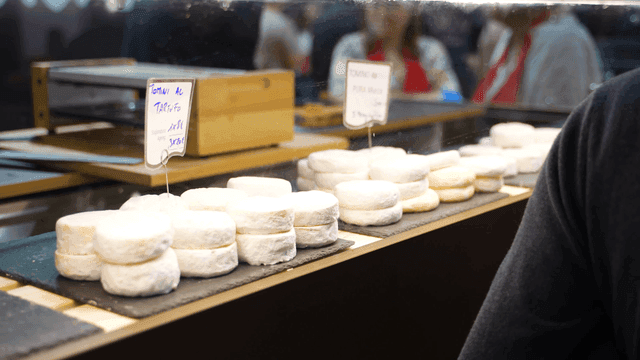 Cheese display at a market stall