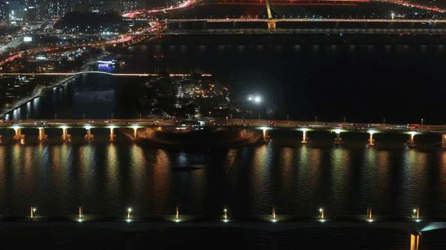 Night view of a city with illuminated bridges