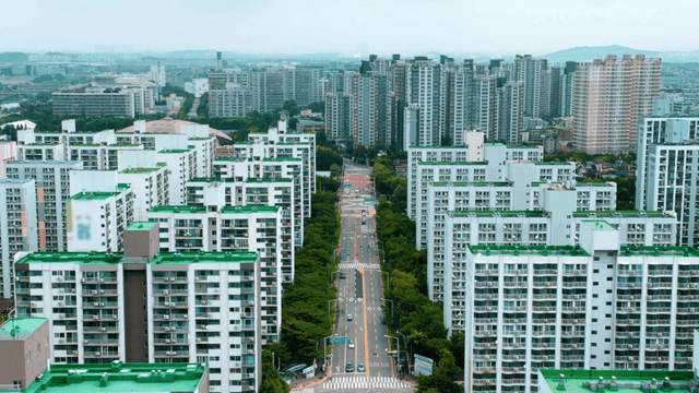 Aerial view of city with high-rise apartments