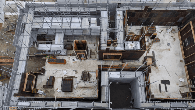 Construction site with scaffolding and materials
