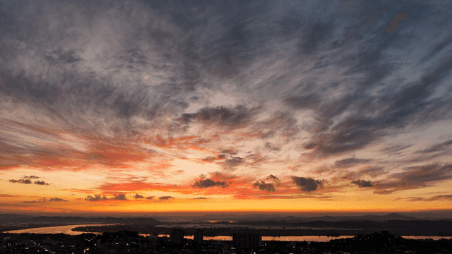 Spectacular sunset unfolding over city landscape