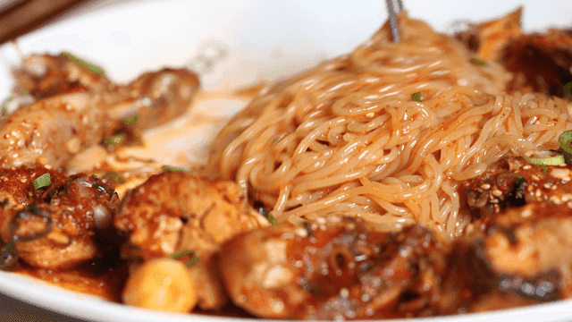 Spicy braised chicken mixed with chopsticks, savory