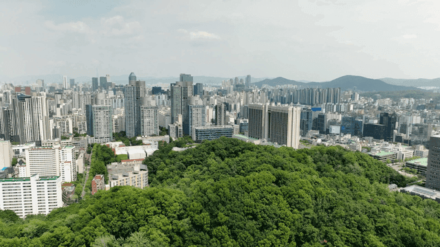 Blue hills and city skyline.