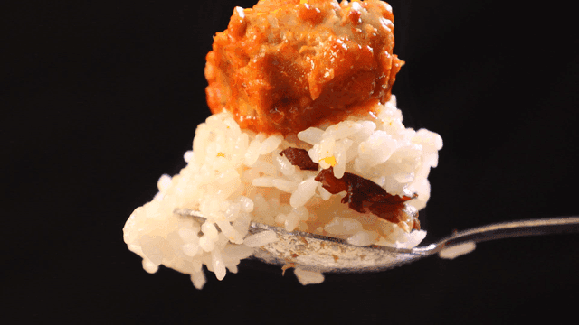 Spoonful of rice topped with seasoned braised anglerfish