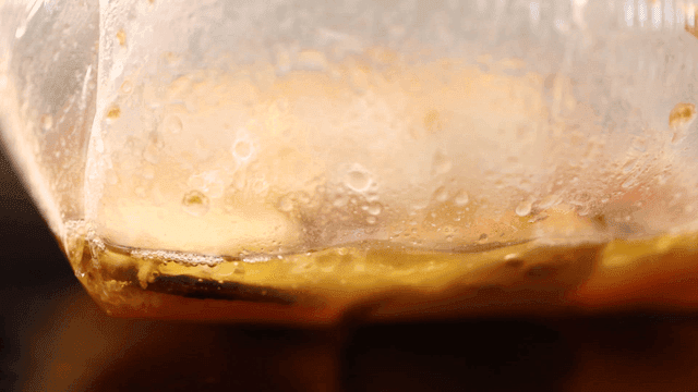 Close-up of a simmering dish in a pot