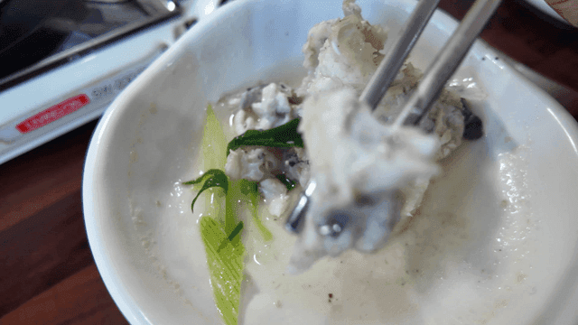 Clear fish soup boiled with green onions