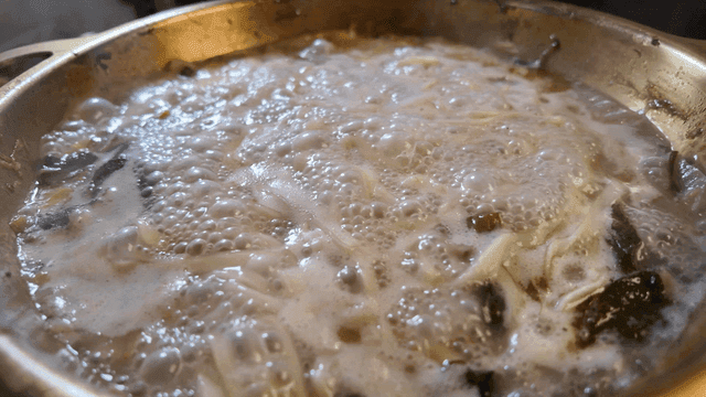 Kalguksu and Hanwoo beef hot pot boiling in pot
