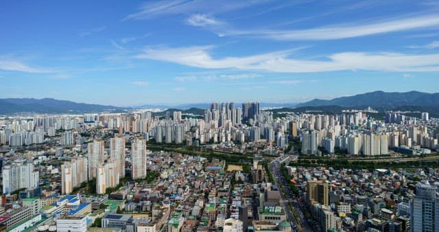 Expansive urban skyline Daegu under a clear blue sky