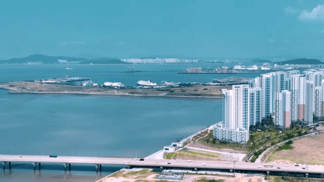 Bridge leading to modern urban landscape