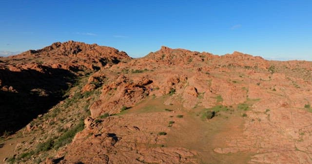 People climbing a rocky mountain