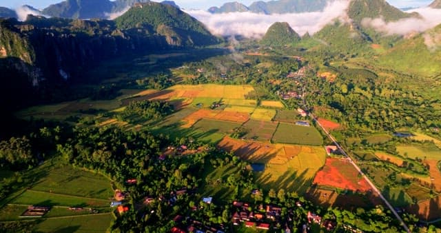 Aerial View of Lush Countryside at Sunrise