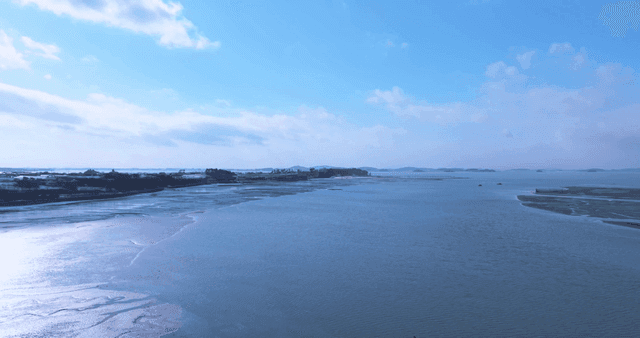 Blue sky and tranquil coastal scenery