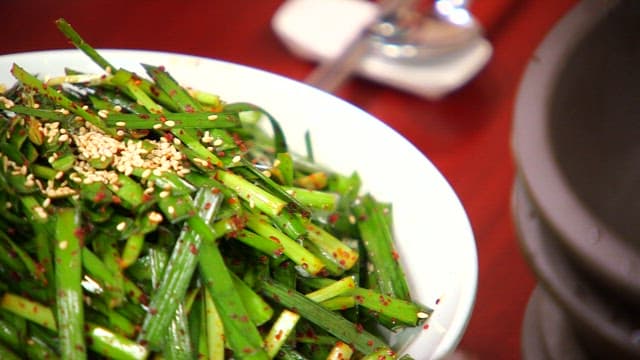 Fresh chive salad sprinkled with sesame seeds