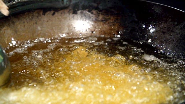 Deep frying food in hot oil