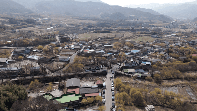 Rural village surrounded by fields