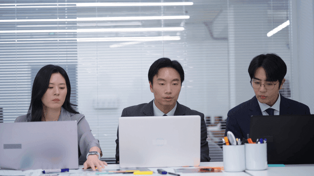 Business meeting with laptops in an office