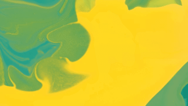 초록색과 노란색 액체가 혼합되는 추상적인 패턴