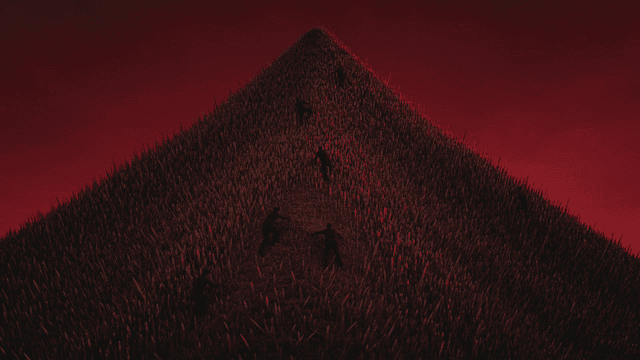 People climbing red, sharp, steep hill