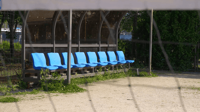 Empty blue seats in sports soccer stadium