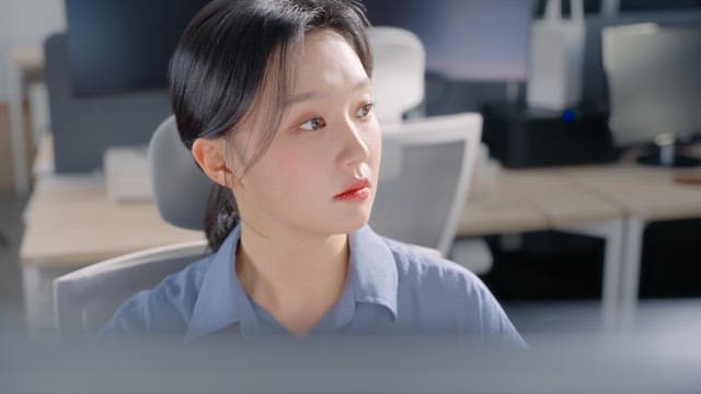 Woman focused on her work at the office