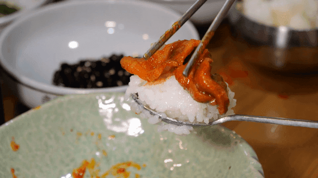 Spicy red pepper paste bulgogi on top of rice
