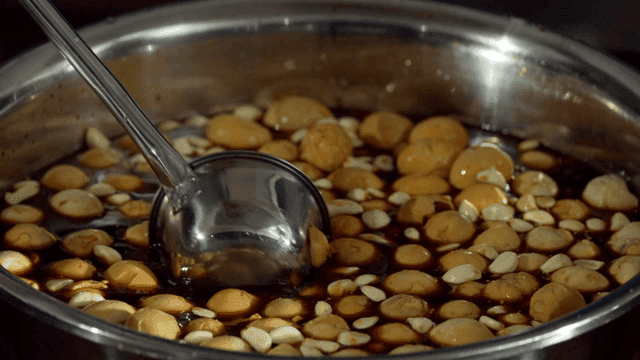 Quail eggs and garlic braised in soy sauce