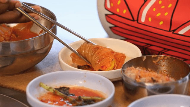 Rolled omelet served with kimchi