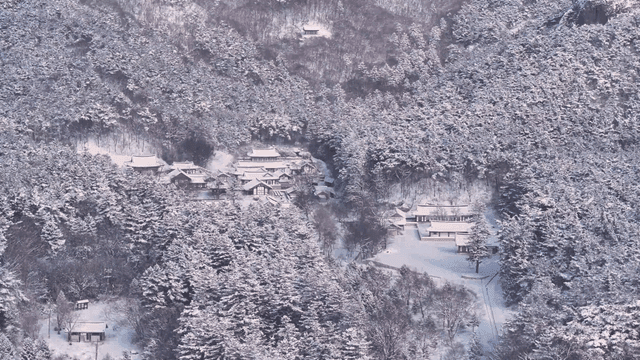 Snow-covered traditional Korean village