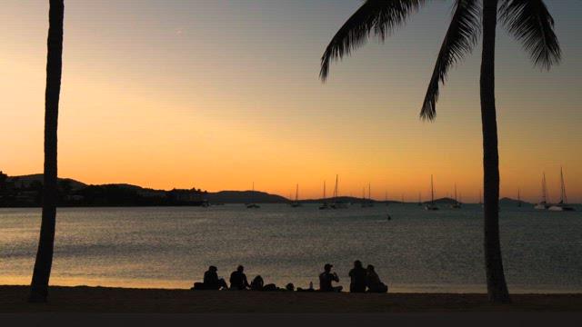 Sunset Gathering at a Tropical Beach