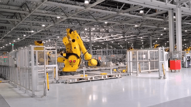 Robotic arm in a modern factory setting