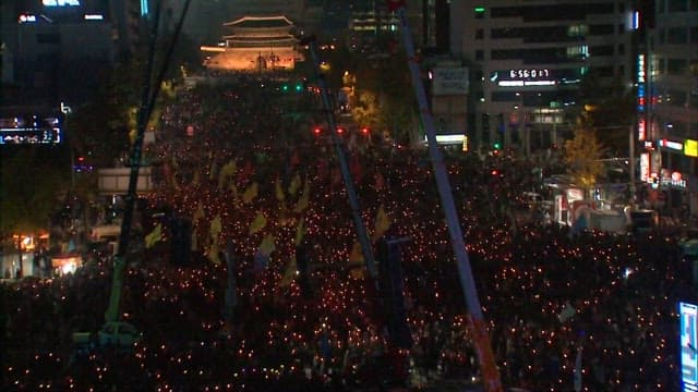 Massive Nighttime Gathering in City Square