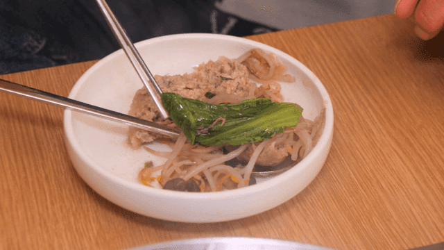 Plate with bean sprouts and meat