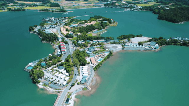 A scenic island with surrounding waters