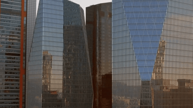 Modern skyscrapers reflecting sunlight