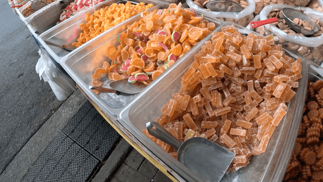 Various old-fashioned jellies displayed in market