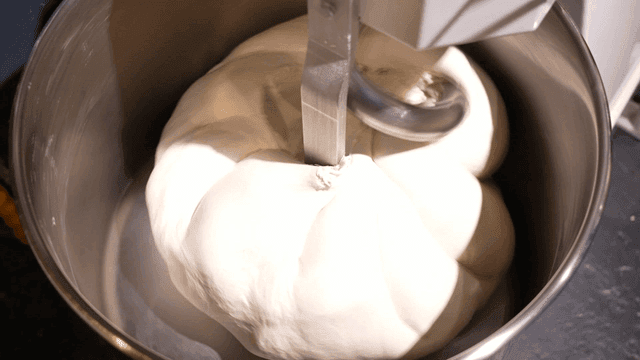 Appearance of dough being mixed in mixer