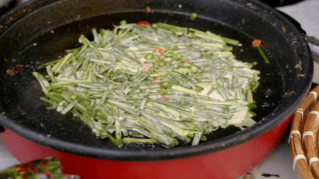 Chive pancakes fried in oil