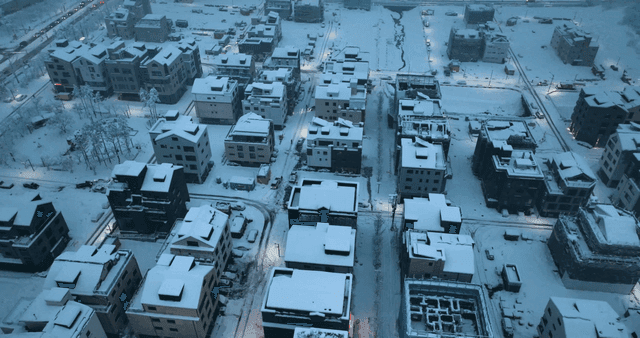 Snow-covered village landscape in winter