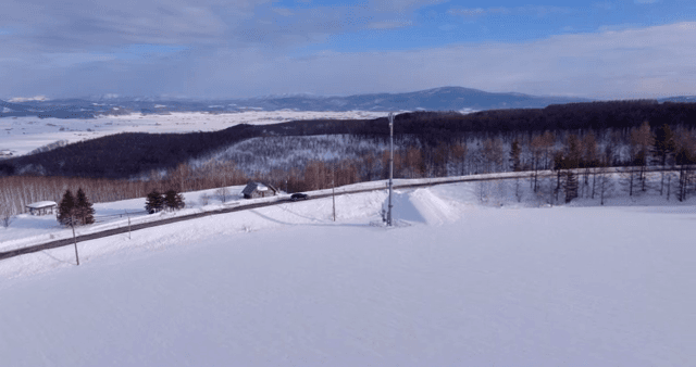 Car driving on a snowy road