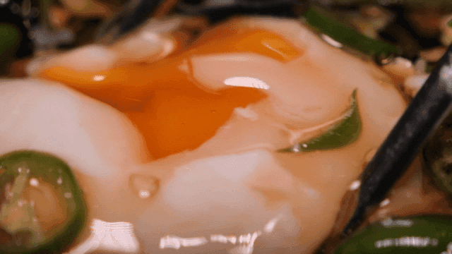 Soy sauce with egg yolk and chili pepper