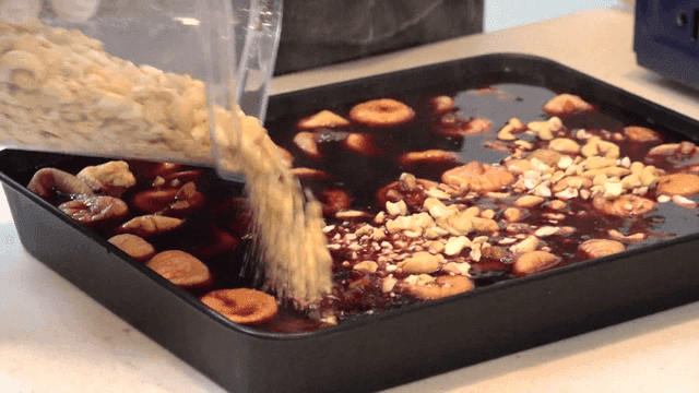 Cashew nuts poured over dried figs and mulled wine
